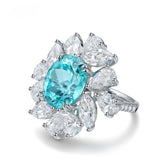 Bague en argent sterling 925 Paraiba créée par Etoilelier Lab, fleur de soleil grenat d'aluminium Yttrium bleu